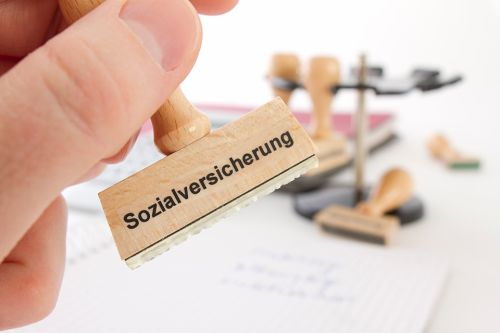 Foto: Stempel mit Sozialversicherung beschriftet